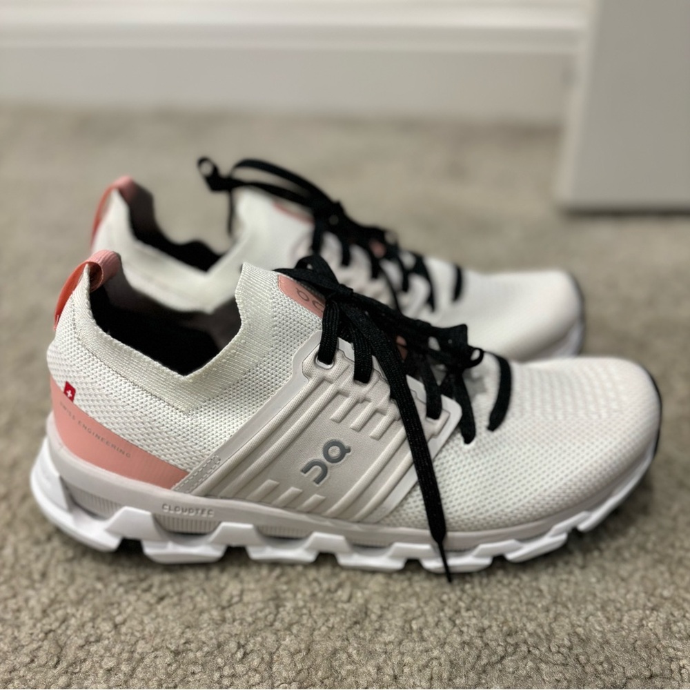 On Running White and Pink Sneakers